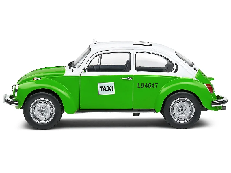 Tribal - hut model toys for anthropology enthusiasts 1974 Volkswagen Beetle 1303 "Mexican Taxi" Green and White 1/18 Diecast Model Car by Solido Tribal - hut model toys for anthropology enthusiasts 1974 Volkswagen Beetle 1303 "Mexican Taxi" Green and White 1/18 Diecast Model Car by Solido