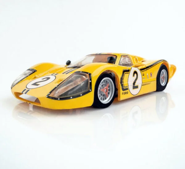 RC cars with high - speed motors for thrill - seeking​ AFX 22014 Ford GT40 MKIV #2 LeMans 1967 Yellow