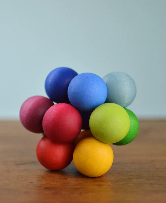 Wooden jigsaw puzzles for patience building​ Grimm's Spiel and Holz - Grasping Beads